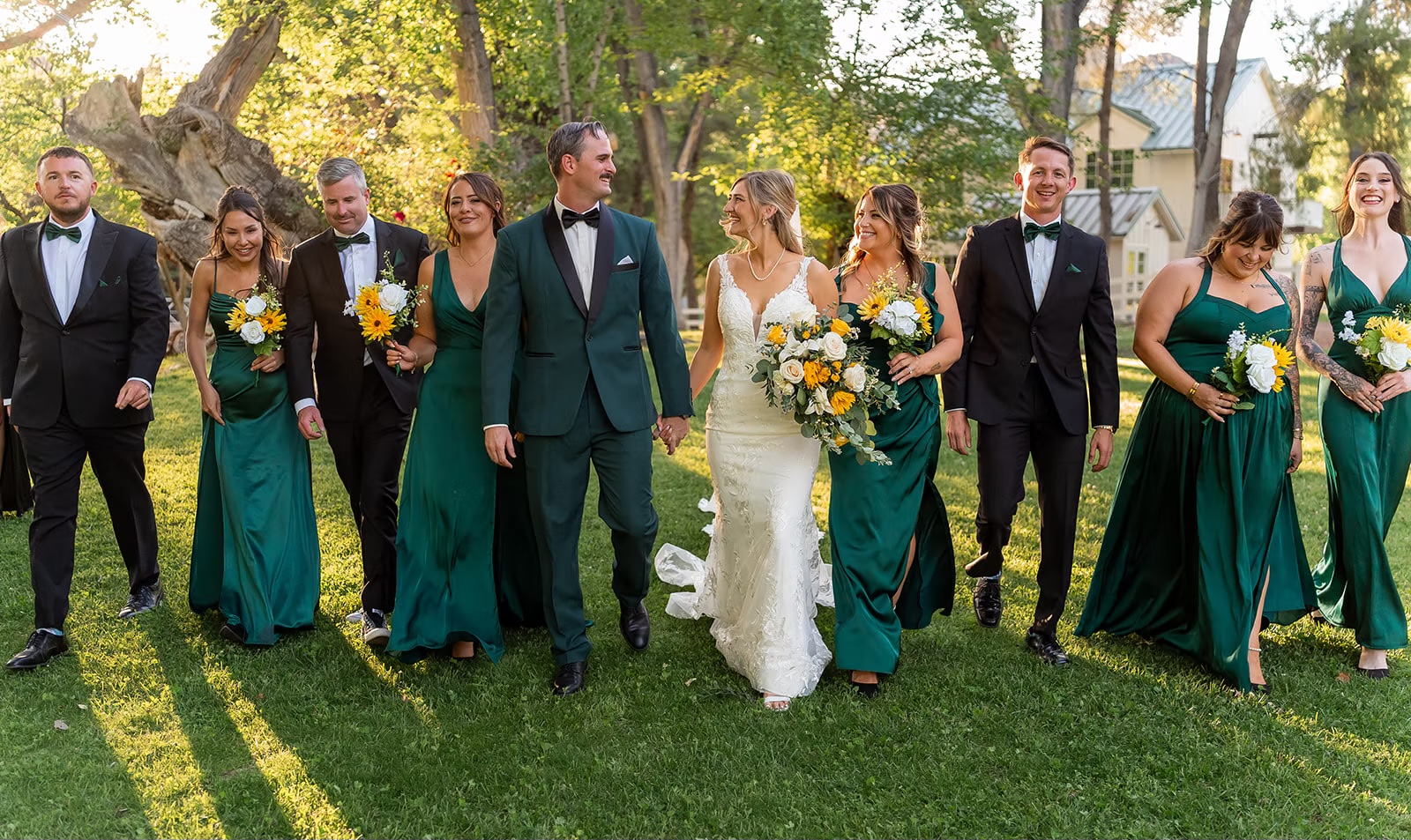 Bride and groom walking with their wedding party during an Arizona wedding